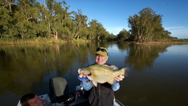 This big: Brian Hinson shows off his catch with Brian King at Barmah Lakes near Echuca.