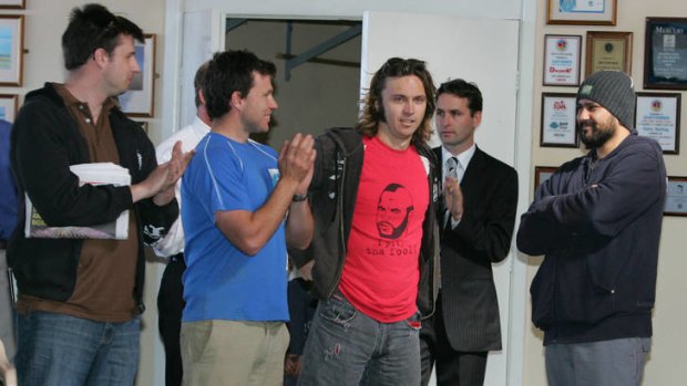 Tim Berry (centre, in red shirt).