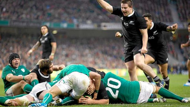 New Zealand's prop Ben Franks crashes over for a try.