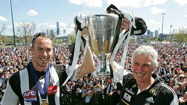 On the same page: Collingwood captain Nick Maxwell and coach Mick Malthouse with the 2010 premiership cup.