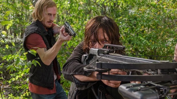 Dwight (Austin Amelio) takes Daryl (Norman Reedus) by surprise in The Walking Dead season 6 episode 15 East.