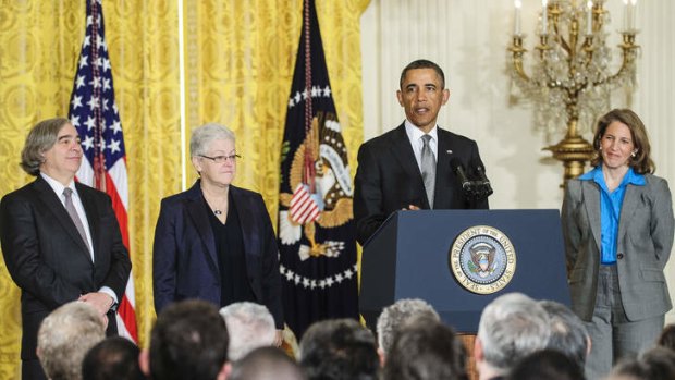 Nominees Ernest Moniz, left, Gina McCarthy, second from left, and Sylvia Mathews Burwell, right, listen as US President Barack Obama announces his choice of  Burwell of the Wal-Mart Foundation as director of the Office of Management and Budget; scientist Moniz as head of the Energy Department; and McCarthy to lead the Environmental Protection Agency (EPA).