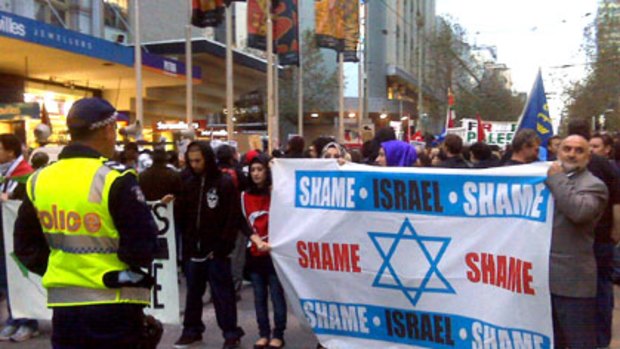 Protesters vent their anger over Israel's attack on a Gaza relief flotilla in Melbourne's Bourke Street Mall.