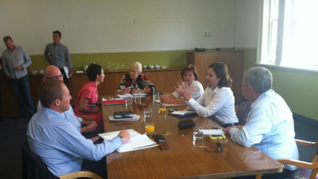 Queensland Labor's seven MPs gather at the Ipswich Art Gallery for their first caucus meeting.