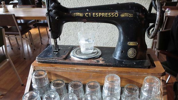 Sewing machine water dispenser at C1 Espresso.
