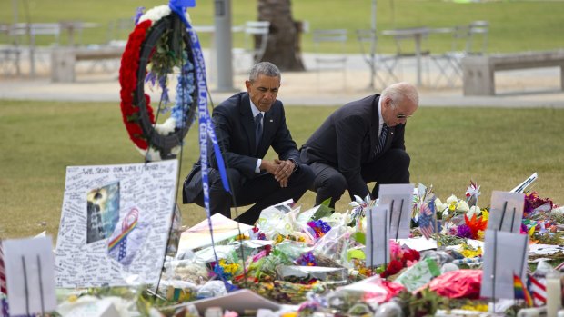 President Barack Obama and Vice-President Joe Biden visit a memorial to the victims of the Pulse nightclub shooting.