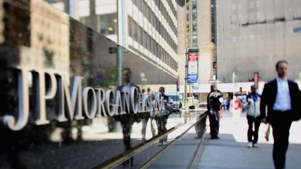 Merchant bank JP Morgan is caught up in the insider trading investigation of one of its staff.