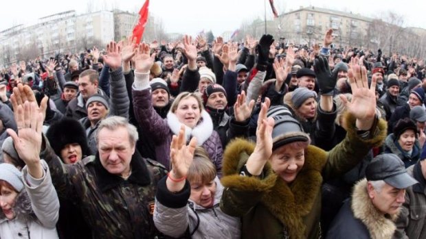 Pro-Russian activists vote during a rally in the centre of the eastern Ukrainian city of Donetsk.