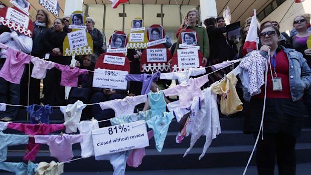 DOCS caseworkers protesting staff shortages outside the Parramatta office.