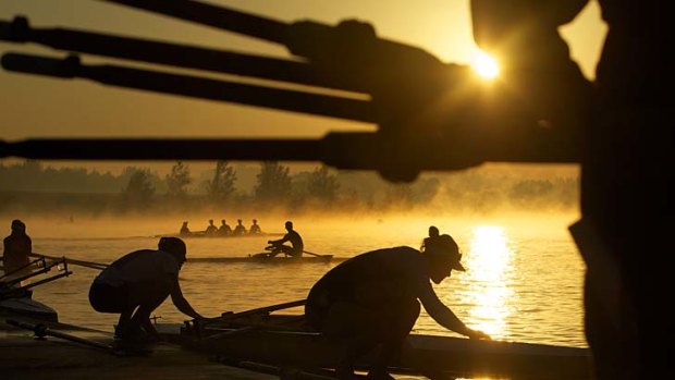 Dawn preparations: Competitors from around the world get ready for a warm-up session at the Sydney International Regatta Centre at Penrith.
