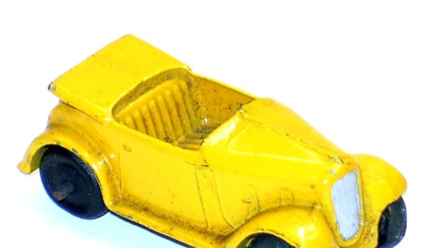 Dinky 2-seater Roadster, yellow. One rear wheel loose, fair. Estimated price $20-$40, sold for $8.