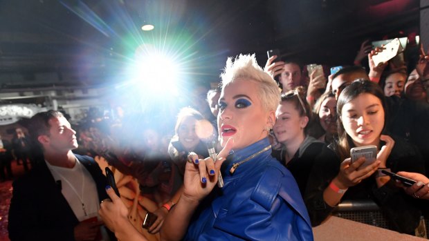 Katy Perry greeting fans at Myer's Sydney City store on Friday.