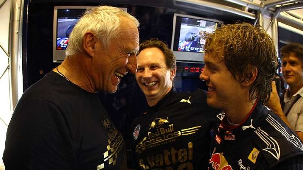 Race winners ...  celebrating  with Sebastian Vettel.