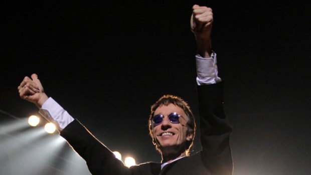 Robin Gibb, pictured performing in Brisbane in 2010, is in a coma in a London hospital.