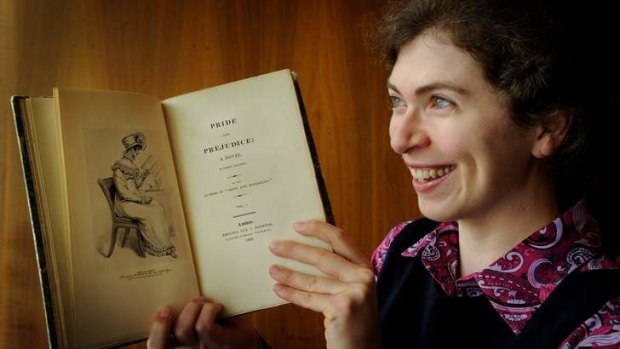 Susannah Helman from the NLA with a 19th century C version of the Jane Austen classic, Pride and Prejudice, which turns 200 this year.