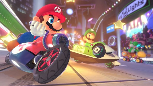Crazy courses: Mario and Luigi go head-to-head in <em>Mario Kart 8</em>.