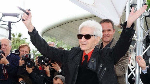 French film director Alain Resnais, who died aged 91 on March 2, 2014, seen posing at Cannes in 2012.