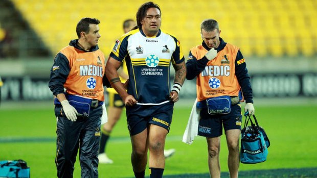 Fotu Auelua of the Brumbies is attended to by medics during the round 13 Super Rugby match between the Hurricanes and the Brumbies at Westpac Stadium on May 18, 2012 in Wellington, New Zealand.