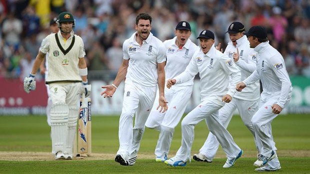 Bowled: James Anderson celebrates after taking the wicket of Michael Clarke.