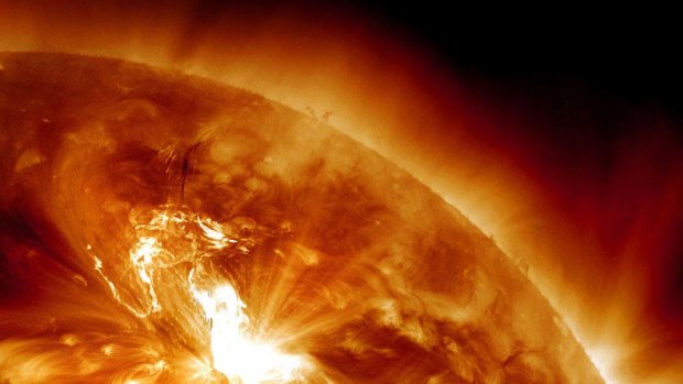 A solar flare erupting on the Sun's northeastern hemisphere.