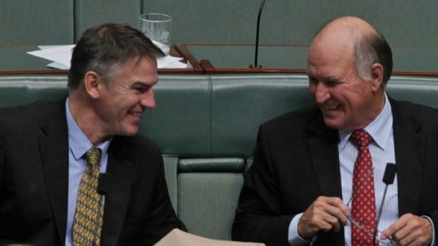 Independent MPs Rob Oakeshott, left, and Tony Windsor have won a list of projects for their regional NSW electorates totalling $820 million.