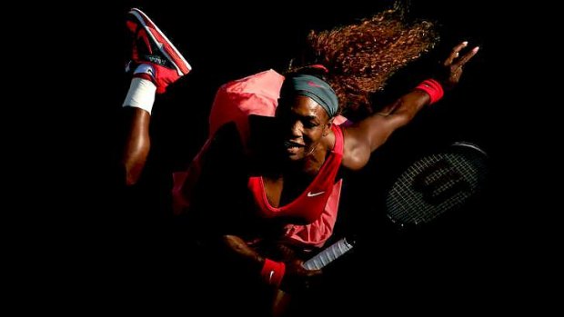 Giving her best shot: Serena Williams during the semi-final at the US Open on Friday.