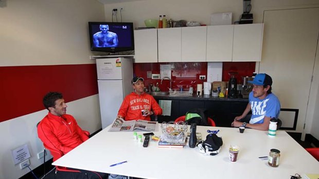 Home away from home: Athletes Youcef Abdi, Ben St Lawrence and Collis Birmingham relax in the kitchen of the altitude house at the Australian Institute of Sport in Canberra.
