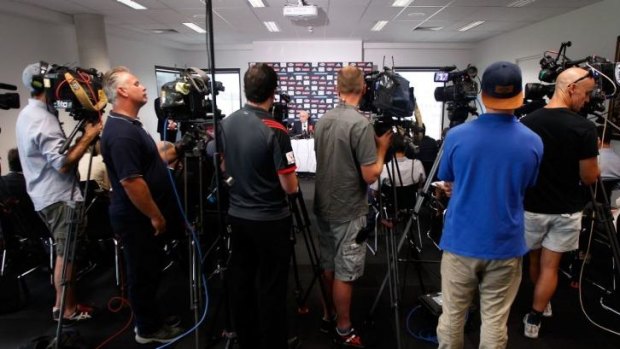 A large media pack looks on during Essendon chairman Paul Little's media conference on Wednesday.