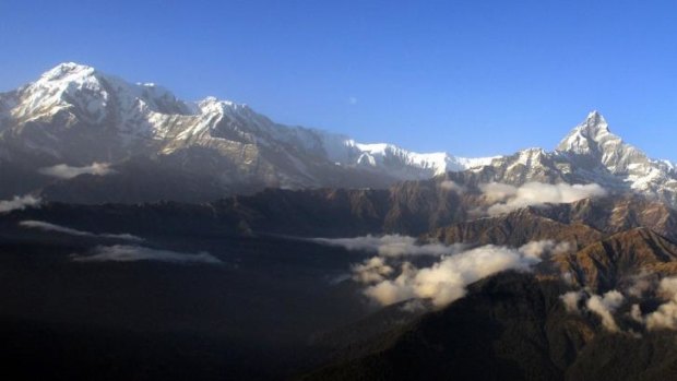 An aerial view of the Himalayan Mountains, from right Mount Machhapuchre (height 6993 metres) and Mount Annapurna (height 8091 metres).