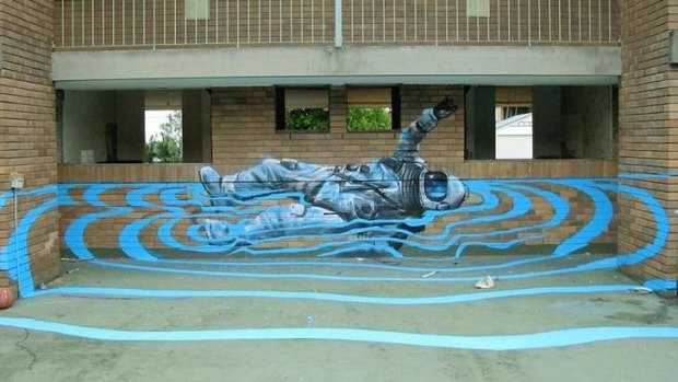 The work of Fintan Magee. This work is in Brisbane, Queensland and titled Felix Backstroke.