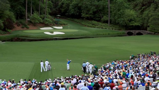 Hard day &#8230; Rory McIlroy tees off on the 12th on his way to posting a 71 in the first round at Augusta.