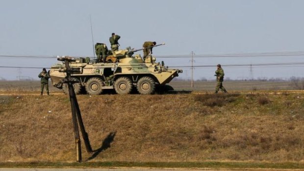 A Russian APC and soldiers near the Crimean town of Djankoy.