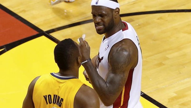 Sydney Kings recruit Sam Young and Miami Heat superstar LeBron James during Game Two of the Eastern Conference Finals at AmericanAirlines Arena on May 24 in Miami during Young's stint with the Indiana Pacers.