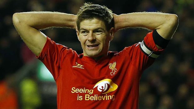 Costly ...Liverpool's Steven Gerrard reacts after his missed penalty.
