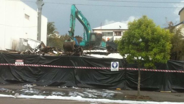 The Belvedere at South Brisbane is demolished after an early morning fire.