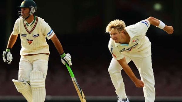 Shane Watson claimed five wickets for NSW including the wicket of Ricky Ponting (L).