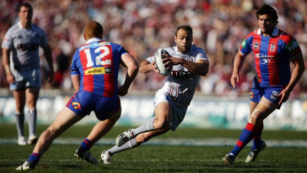 Brett Stewart of the Sea Eagles makes a break during the round 24 NRL match aginst the Newcastle Knights at Brookvale Oval.