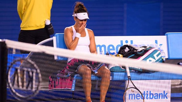 The end is nigh: Casey Dellacqua during a break in her women's singles match against Canada's Eugenie Bouchard.