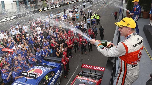 Exalted: Craig Lowndes celebrates his win on Saturday.