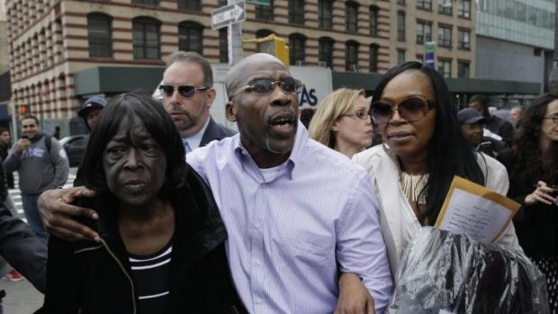 Jonathan Fleming exits the courthouse with his mother Patricia Fleming, left, and his ex-wife Valerie Brown. 