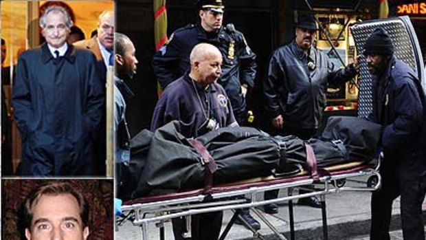 "An innocent victim"... medical examiners remove the body of Mark Madoff from his Manhattan home, inset; Bernard and Mark Madoff.