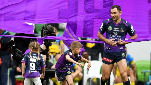 Storm's Cameron Smith runs out with his children for his 356th game.