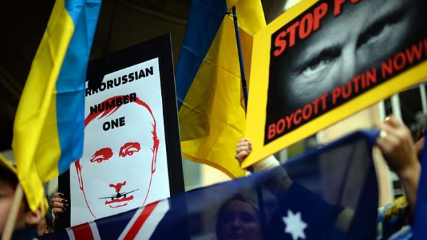 Outrage: Members of the Australian Ukrainian community protest against Putin coming to Australia for the G20 summit.