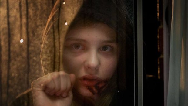 Chloe Moretz in the film <i>Let Me In</i>.