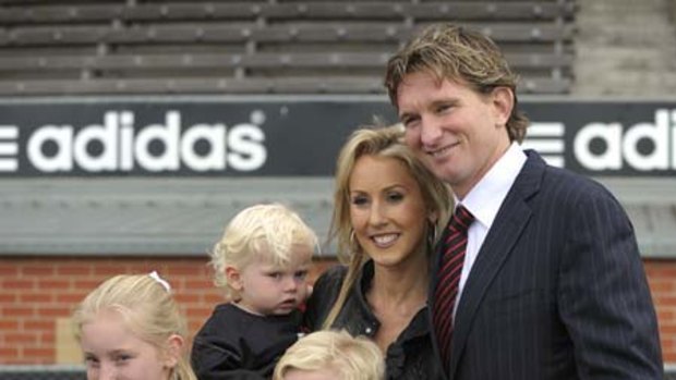 James Hird with his wife, Tania, and children.