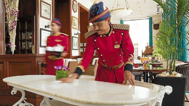 Staff at New Delhi's Imperial Hotel maintain the table.