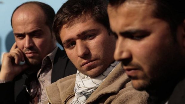 Awaiting visas: Shafiq Nazari, 38, from left, Shirullah Mirzamik, 23, and Sardar Khan, 26,