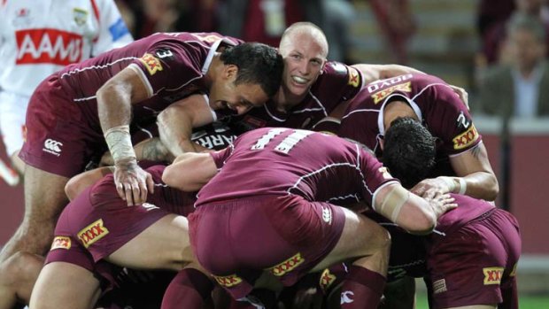 All smiles ... Darren Lockyer grins as Greg Inglis crashed over for another try.
