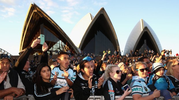 Long time coming: Sharks fans show their support during the NRL grand final fan day at the Opera House.