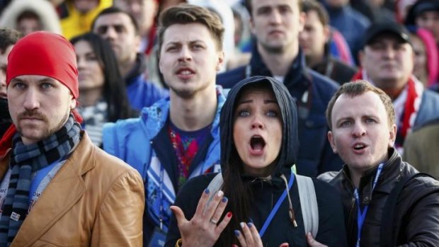 A mix of shock and anger ... Russian fans react as they watch a broadcast of the ice hockey quarter-final.